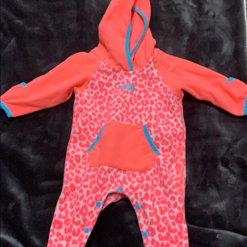 Sold ** North face onesie 0/3 months